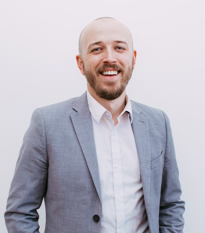 smiling man in suit